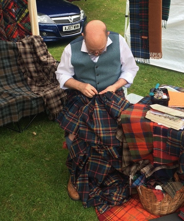 Kilt sewing at a open air event